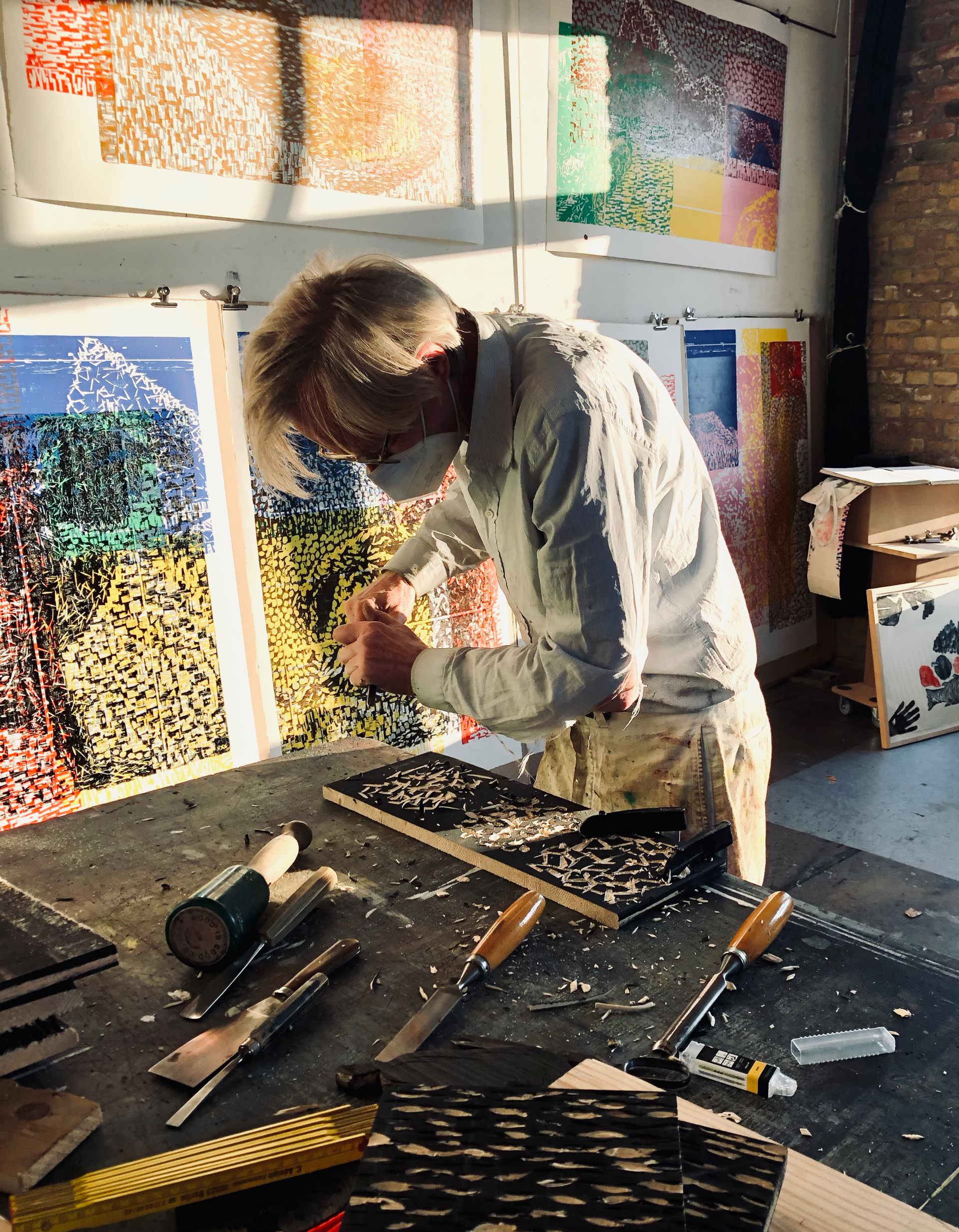 Matthias Mansen working on the block print designs in his atelier in Berlin.