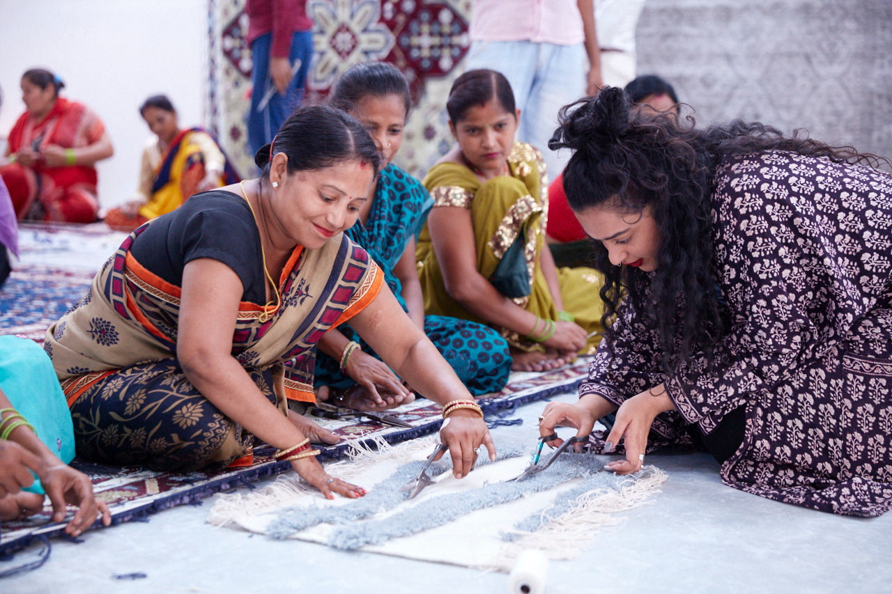 Akanksha Deo Sharma working on product development with Rangsutra artisans.